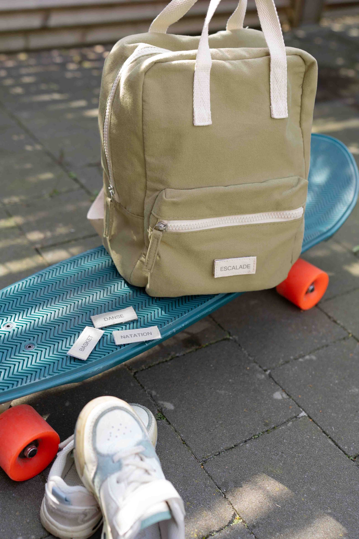 sac à dos vert personnalisable abec le sport de l'enfant